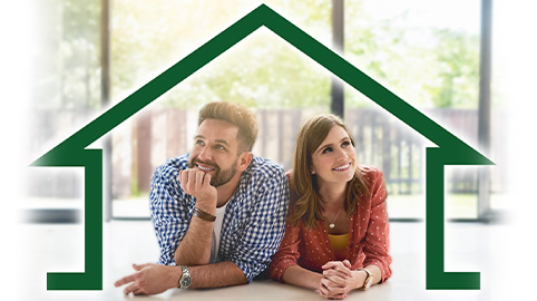 Couple under outline of house