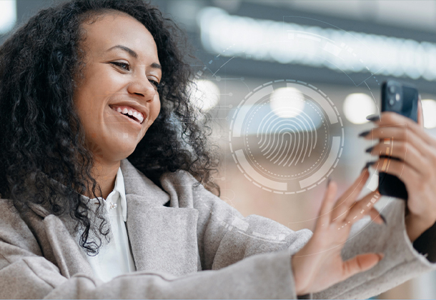 Woman tapping phone with transparent fingerprint on screen