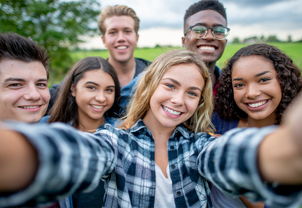 Group of teens taking a photo