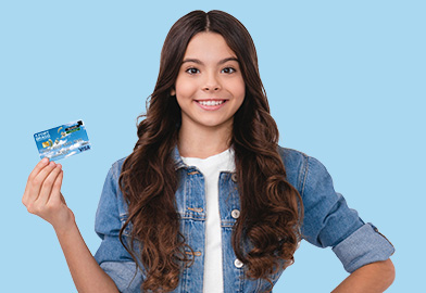 Happy teen holding a debit card